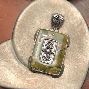 Rectangle shape sterling silver pendant with semi precious stone.